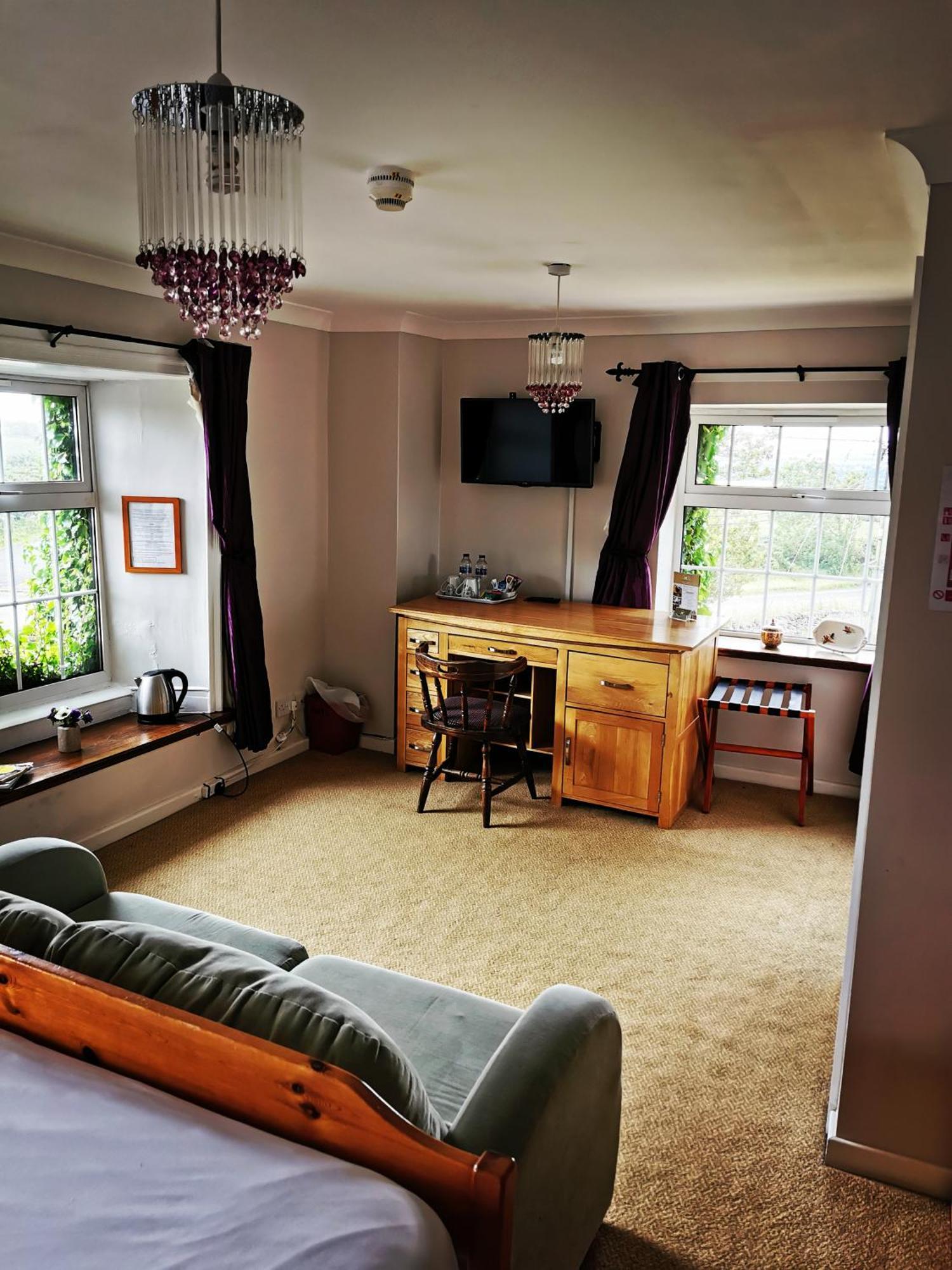 The Manor House Inn コンセット 部屋 写真